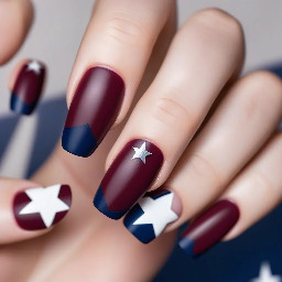 Maroon nails with navy blue ring finger with white star outline
