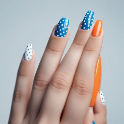 Sea blue and orange alternating nails. Blue ring finger with white polkadot