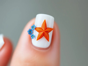 short white square nails with small blue hibiscus flowers in the corner and an orange star fish