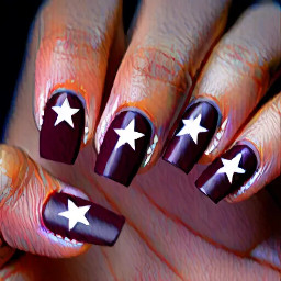 Dark maroon nails with navy blue ring finger with white star outline
