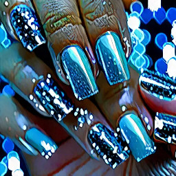 I am wearing a silk light blue dress with sparkles and accessorizing with sparkly silver heels and a sparkly silver handbag for my dance. I want my nails to match my fut
