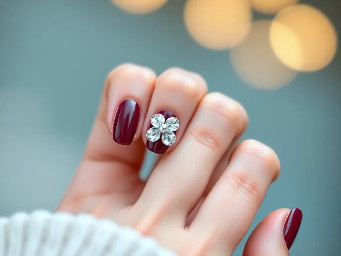 almond oval almond nails,maroon or natural colour, add some little silver pearls, flower on the ring finger