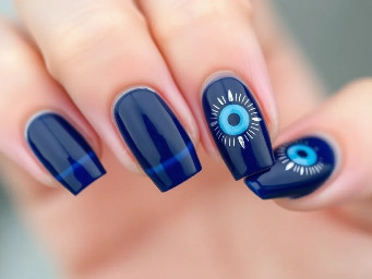 I want navy blue color french tip on all . Evil eye theme at least one of them has it. Add flowers of gel. Add details with silver lines or dots