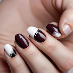 marron nails that say luray in marroon white and black