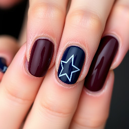 Dark burgundy nails with navy blue ring finger with white star outline