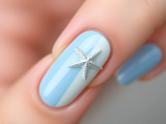 Simple blue and white almond nails with starfish on the middle finger