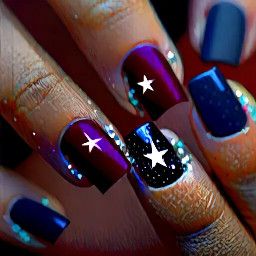 Deep maroon nails with ring finger nail navy blue with a sparkly star