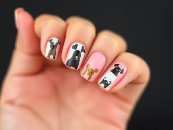 Short almond pink nails with dog prints