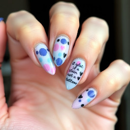 Steve lacy oh yeah? Album inspired nails, almond shape, random soft shapes blues pinks purples calm tattoos and the quote “life is but a stain not a tattoo”