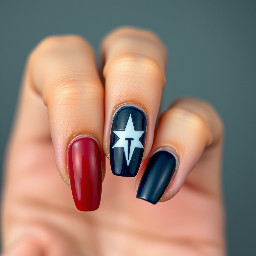 Dark red nails with navy blue ring finger with white star outline