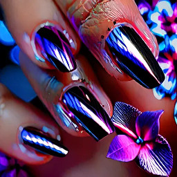 Stiletto black nails with purple iridescent flower , pink iridescent flower, blue iridescent flower