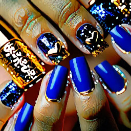 Royal blue nails, ring finger nail glittery gold with a heart that starts on the edge on one side and ends on the edge on the other side of the nail