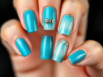 LEFT HAND: left pinky: fully torquoise catseye, left ring finger: gradient french tip in torquoise catseye with a metallic bow in the middle, left middle finger: fully torquoise catseye with a metallic heart in the middle, left Pointer finger: french tip in torquoise catseye with a metallic bethleham star int he centre of the nail, left thumb: Slanted to the left gradient french tip in torquoise catseye with metallic pearls following the end of the gradient. RIGHT HAND: right thumb: slanted to the right gradient french tip in torquoise catseye, right pointer finger: torquoise catseye french tip with metallic pearls following the inside line of the smooth end of the french tip, right middle finger: fully torquoise catseye with a metallic heart in the middle, right ring finger: french ti[ in torquoise catseye with a metallic 4 sided star in the centre of the nail, right pinky: fully torquoise catseye with a metallic bow in the middle.