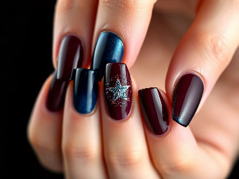 Deep maroon nails with ring finger nail navy blue with a sparkly star