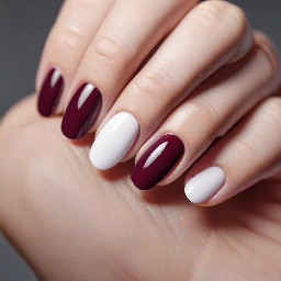 Burgundy short oval nails with thin white french tips