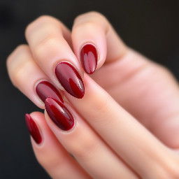 sharper almond shape with like a dark brown red color with a simple design that's easy for beginners maybe some 3d gel art with gold chrome