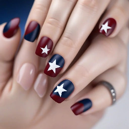 Dark red nails with navy blue ring finger with white star outline