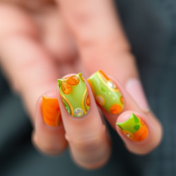 Green and orange glassblocks with mother ofearl design nails