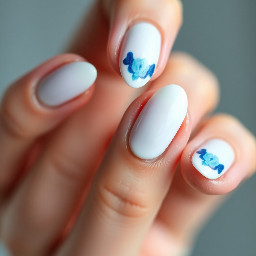 Almond shaped white nails with hints of blue