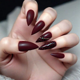 cute dark red stilletto nails. not super complicated but also not boring. simple patterns that would be easy for a beginner nail tech with gel x materials. not basic white girl stuff, but not gothic either. kind of like a regina george or sabrina carpenter style of simple dark red stilletto nails. also colors and styles that would look good on tanned meditteranean tone skin.